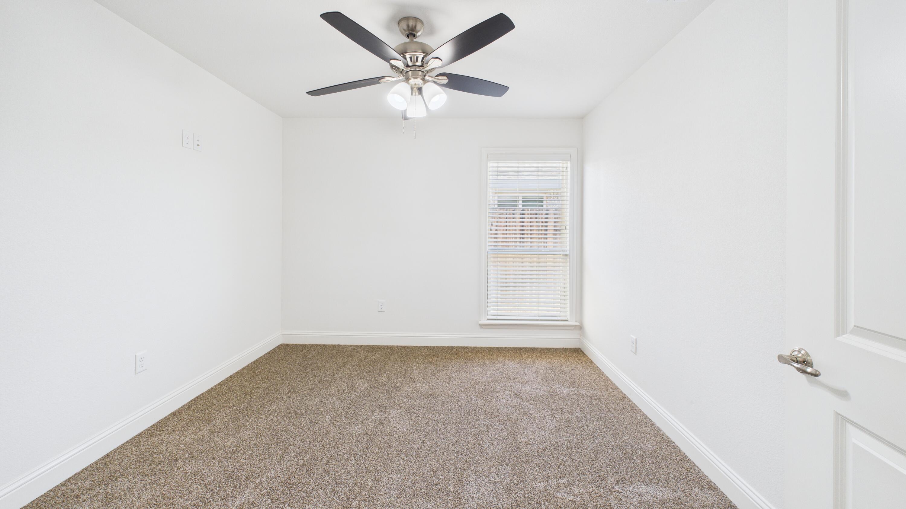 7107 23rd Street Lubbock, TX 79407 - Photo 37 of 49 an empty room with a window