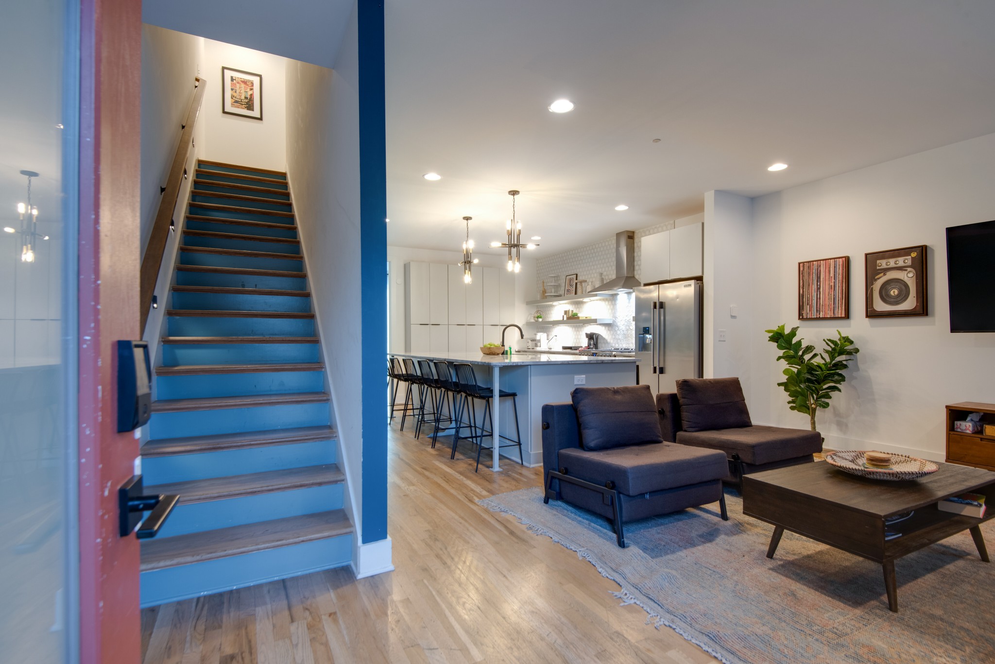 2809 Delaware Avenue, Unit 202 Nashville, TN 37209 - Photo 14 of 40 a living room with furniture and a wooden floor