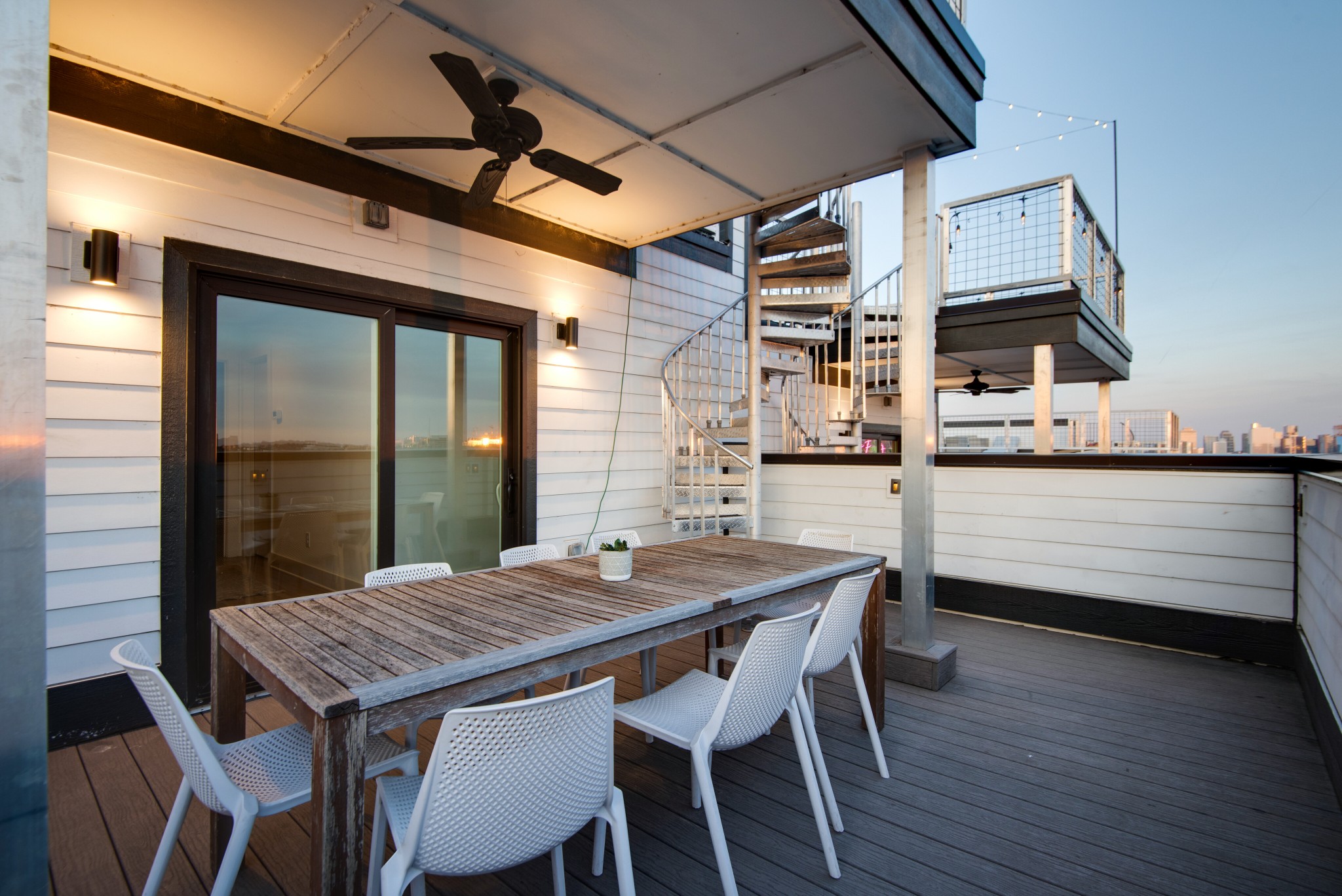 2809 Delaware Avenue, Unit 202 Nashville, TN 37209 - Photo 24 of 40 a dinning table and chairs in front of a house