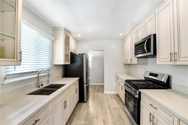 a view of kitchen and washer and dryer