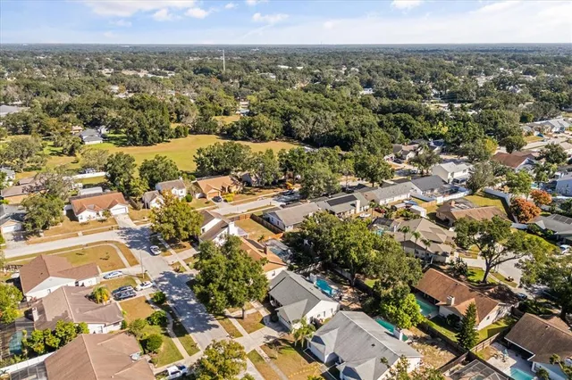 an aerial view of residential house with outdoor space
