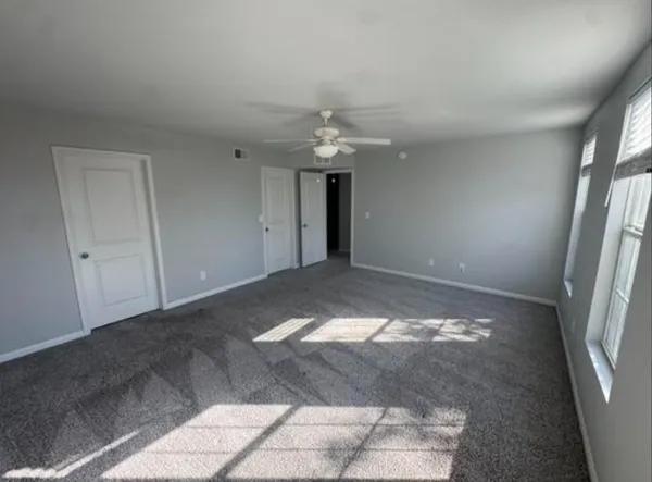 a view of a chandelier in an empty room
