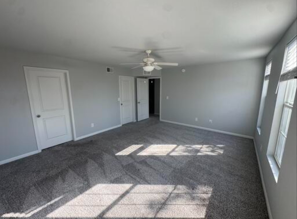 411 Wetzel Kyle, TX 78640 - Photo 17 of 28 a view of a chandelier in an empty room