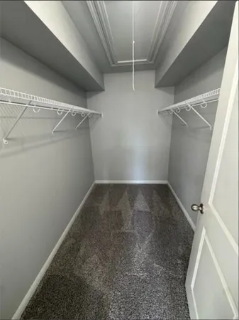 a view of a room with racks on the wall