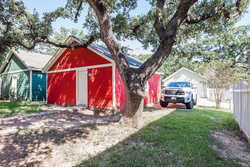 411 Wetzel Kyle, TX 78640 - Photo 3 of 28 a view of a house with a yard and sitting area