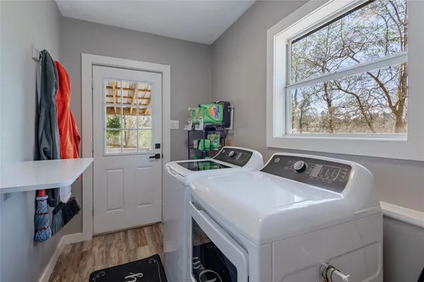 a utility room with dryer and washer