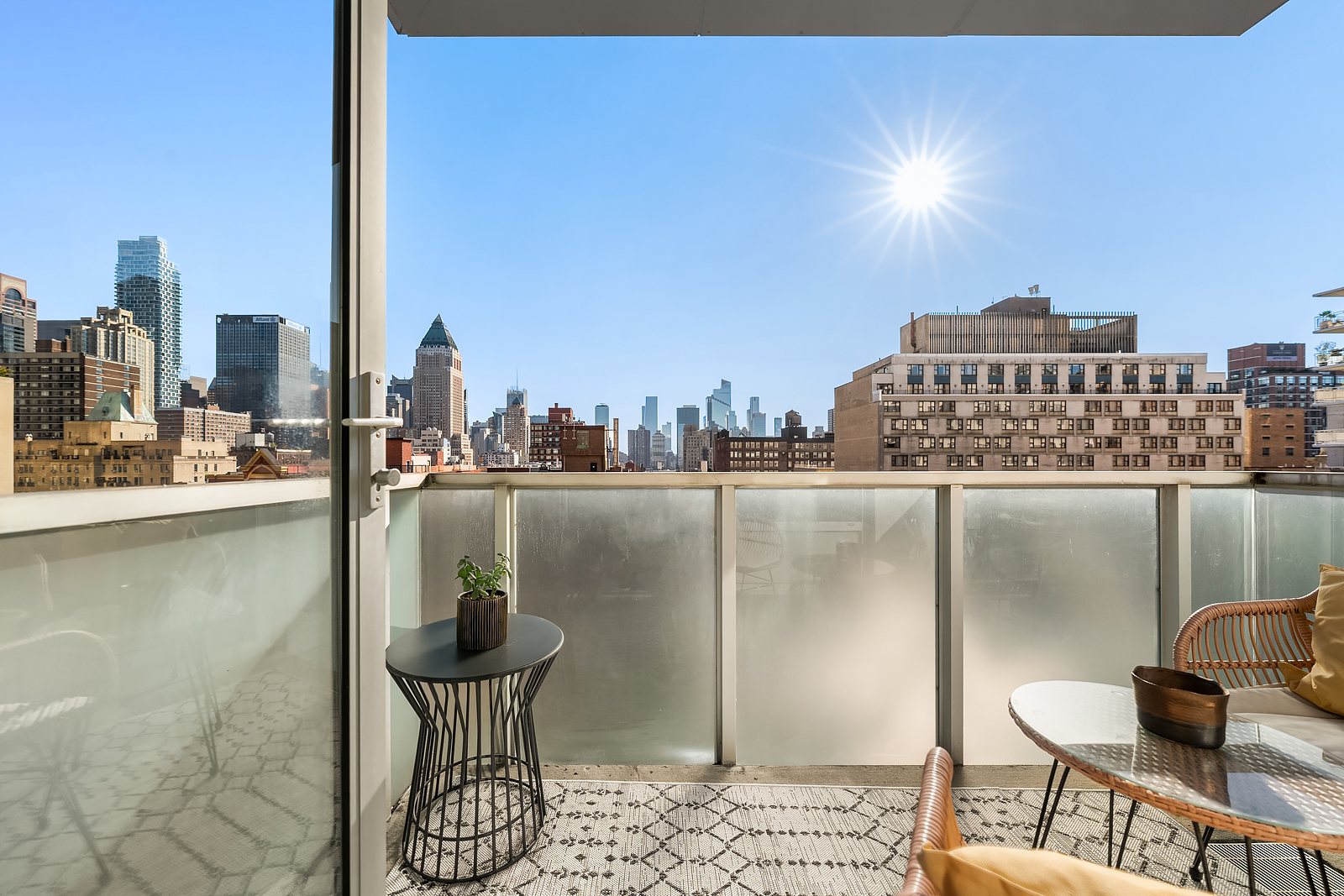 426 West 58th Street, Unit PH3 Manhattan, NY 10019 - Photo 14 of 22 a view of a balcony with chairs