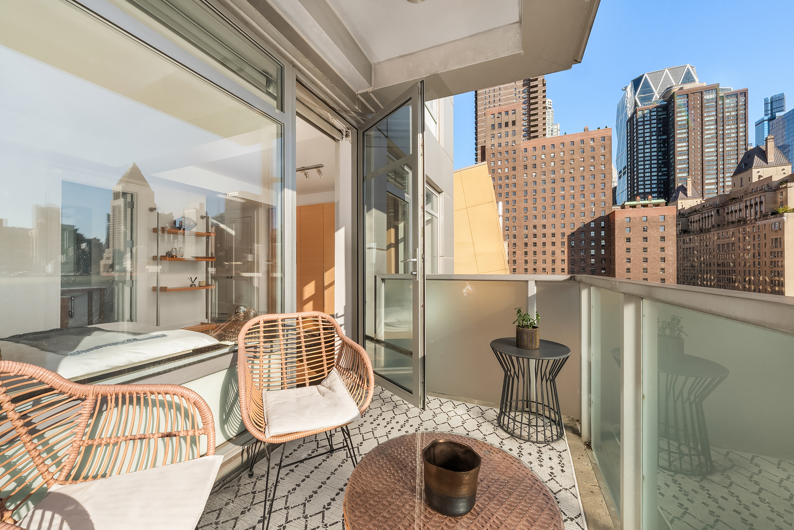 426 West 58th Street, Unit PH3 Manhattan, NY 10019 - Photo 19 of 22 a view of balcony with a couch