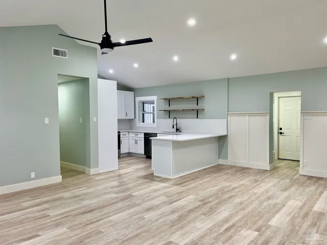 a view of an empty room and window