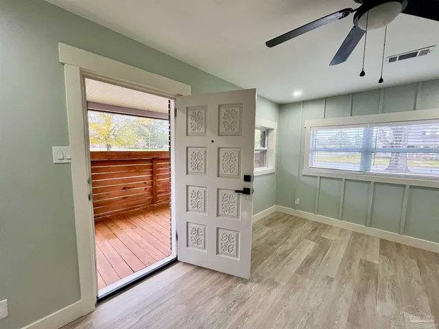 a bathroom with a sink vanity and a mirror