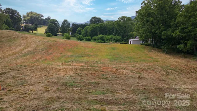 a view of a backyard of the house