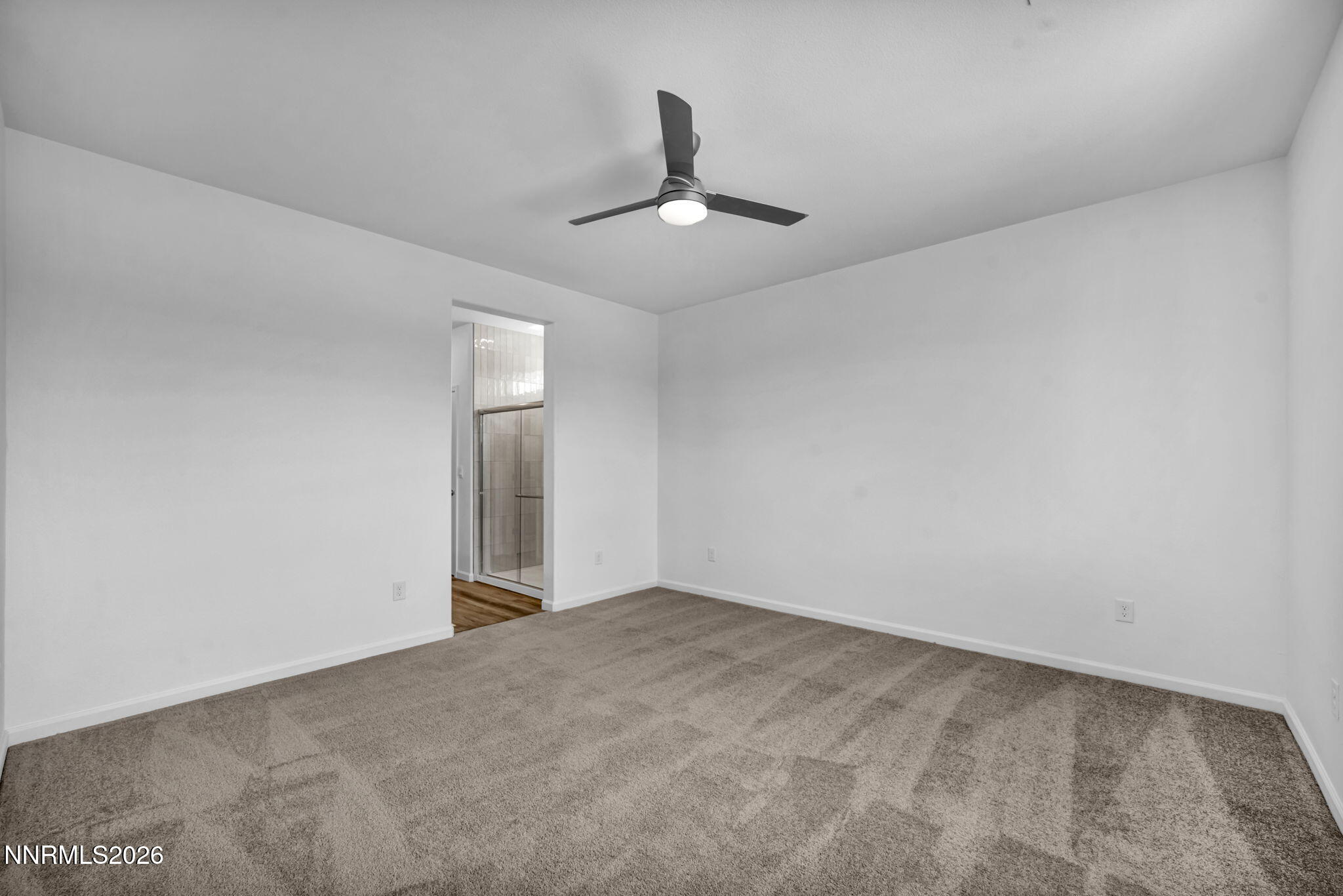 6676 Morgan Mill Road, Unit HOMESITE 14 Carson City, NV 89701 - Photo 13 of 24 wooden floor in an empty room