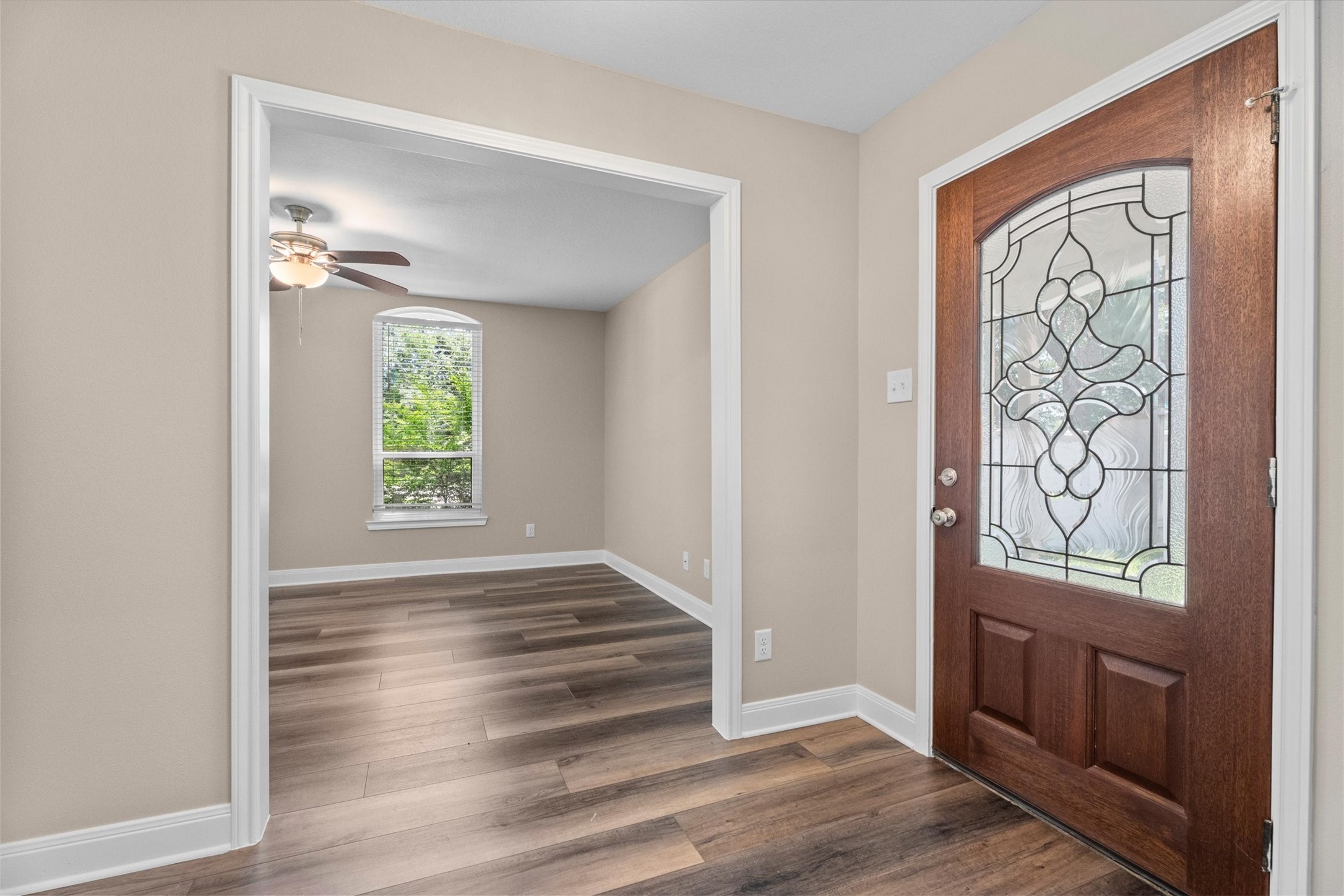 6530 Bayonne Drive Spring, TX 77389 - Photo 10 of 37 a view of an entryway with wooden floor and a window