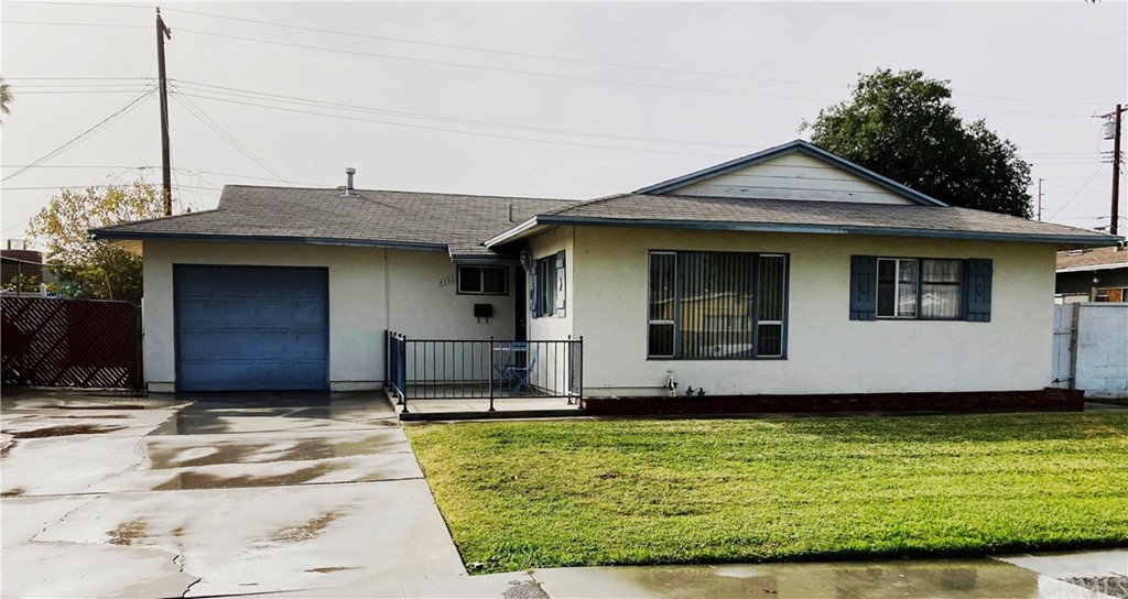 4156 Goodman Street Riverside, CA 92503 - Photo 1 of 1 a view of a house with a yard