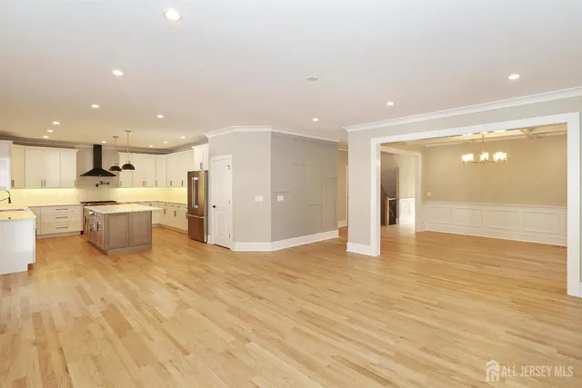 a view of kitchen with wooden floor