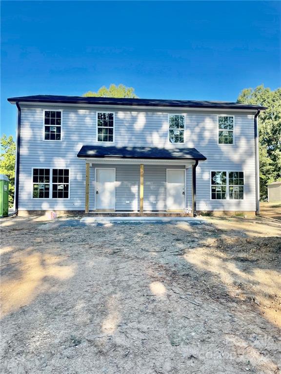 1466 B Street Mount Pleasant, NC 28124 - Photo 1 of 5 front view of a house with a yard