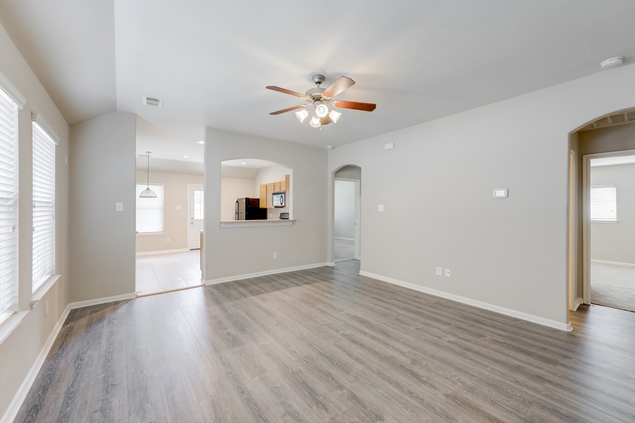 6839 Tammany Manor Lane Spring, TX 77379 - Photo 4 of 25 Noticing the laminate wood floors