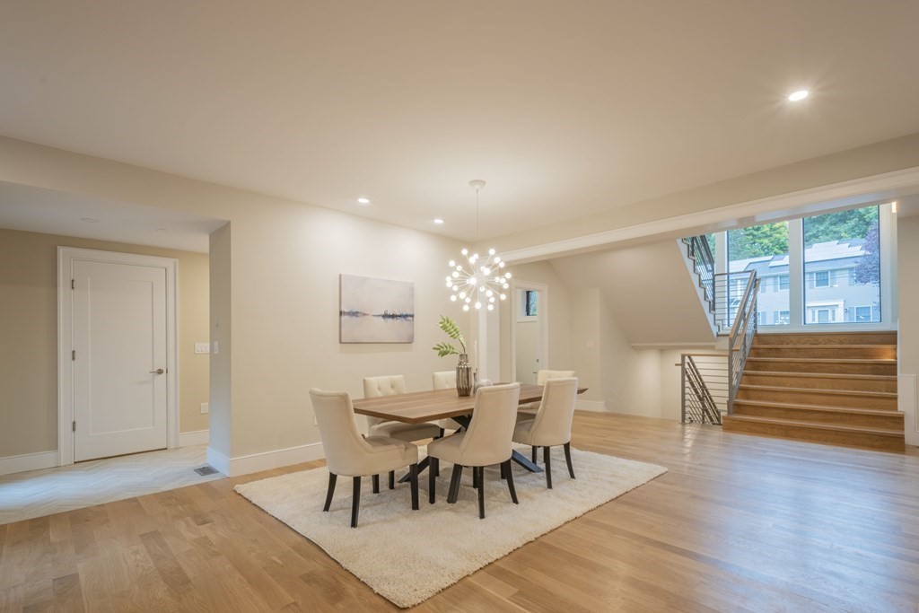11 Sherburne Road Lexington, MA 02421 - Photo 8 of 42 a view of a dining room with furniture and wooden floor
