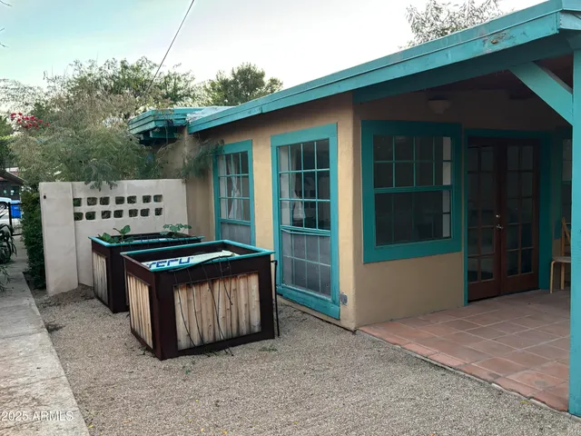 a view of a house with a tub and porch