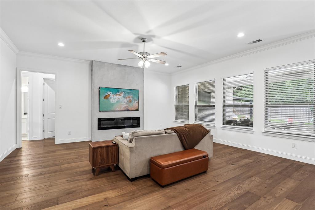 515 West Laureland Road Dallas, TX 75232 - Photo 4 of 32 a living room with furniture ceiling fan and a window