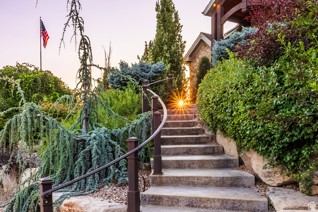 694 West Cephus Road Draper, UT 84020 - Photo 7 of 148 Stone staircase with wrought iron railing leading to the property entrance