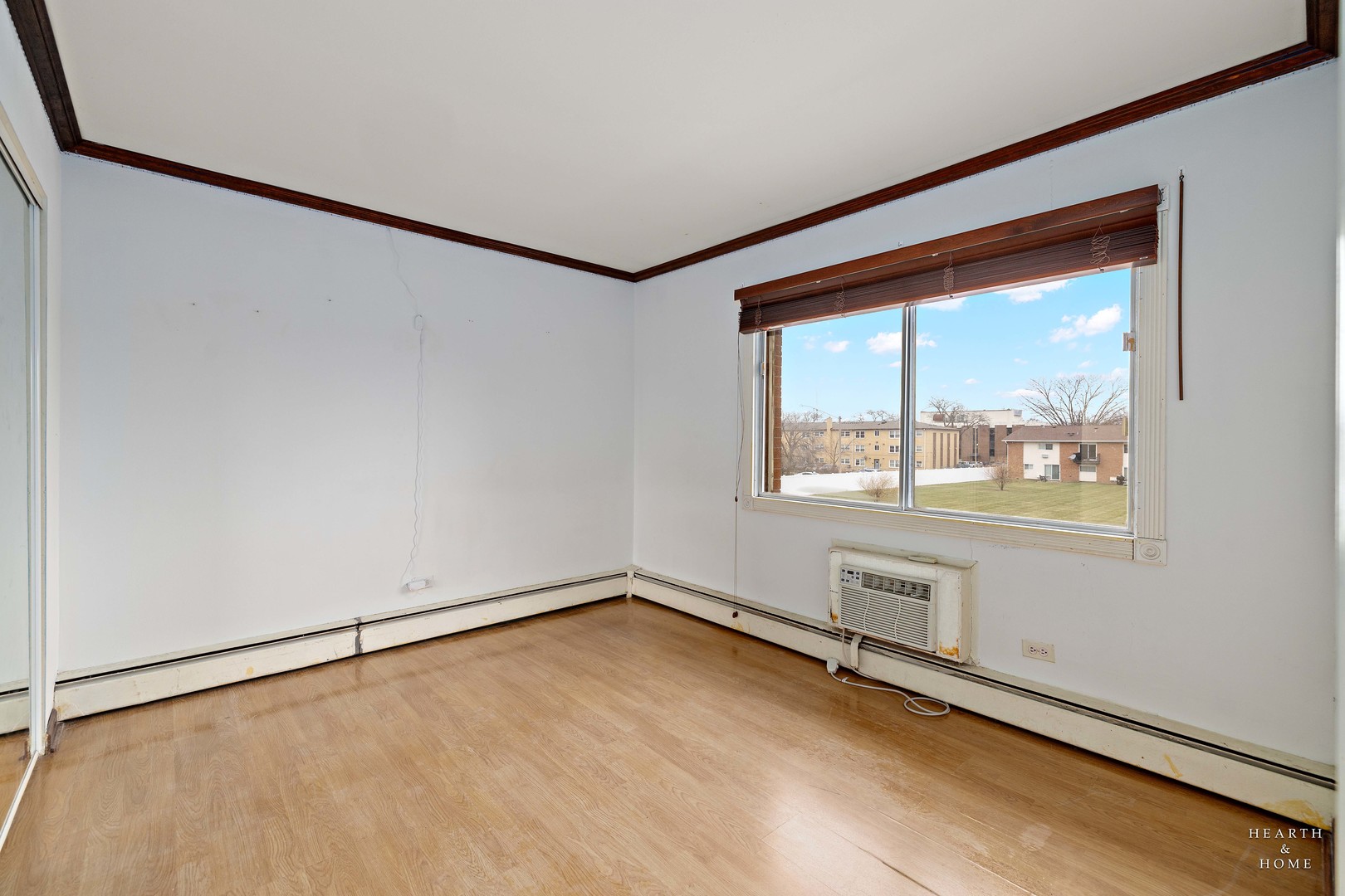 9500 Dee Road, Unit 2F Des Plaines, IL 60016 - Photo 14 of 20 an empty room with a window