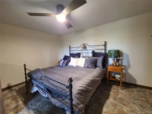 a bathroom with a sink toilet and a mirror