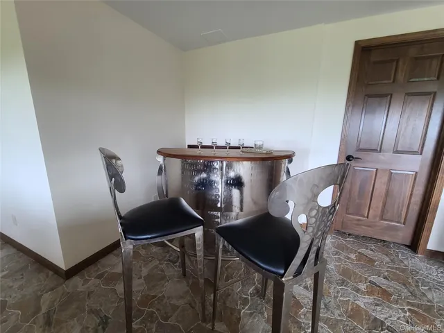 a view of outdoor space with wooden floor and deck