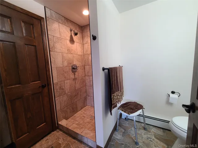 a view of outdoor space with a garden and trees