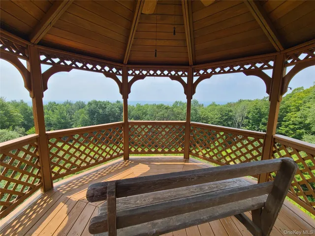 an aerial view of residential house with outdoor space and swimming pool