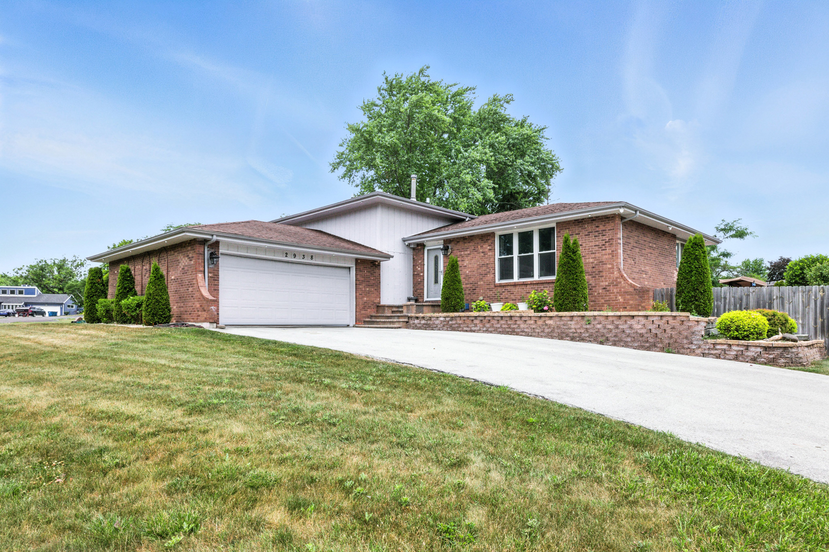 2938 East Shagbark Trail Crete, IL 60417 - Photo 1 of 26 a house view with a garden space