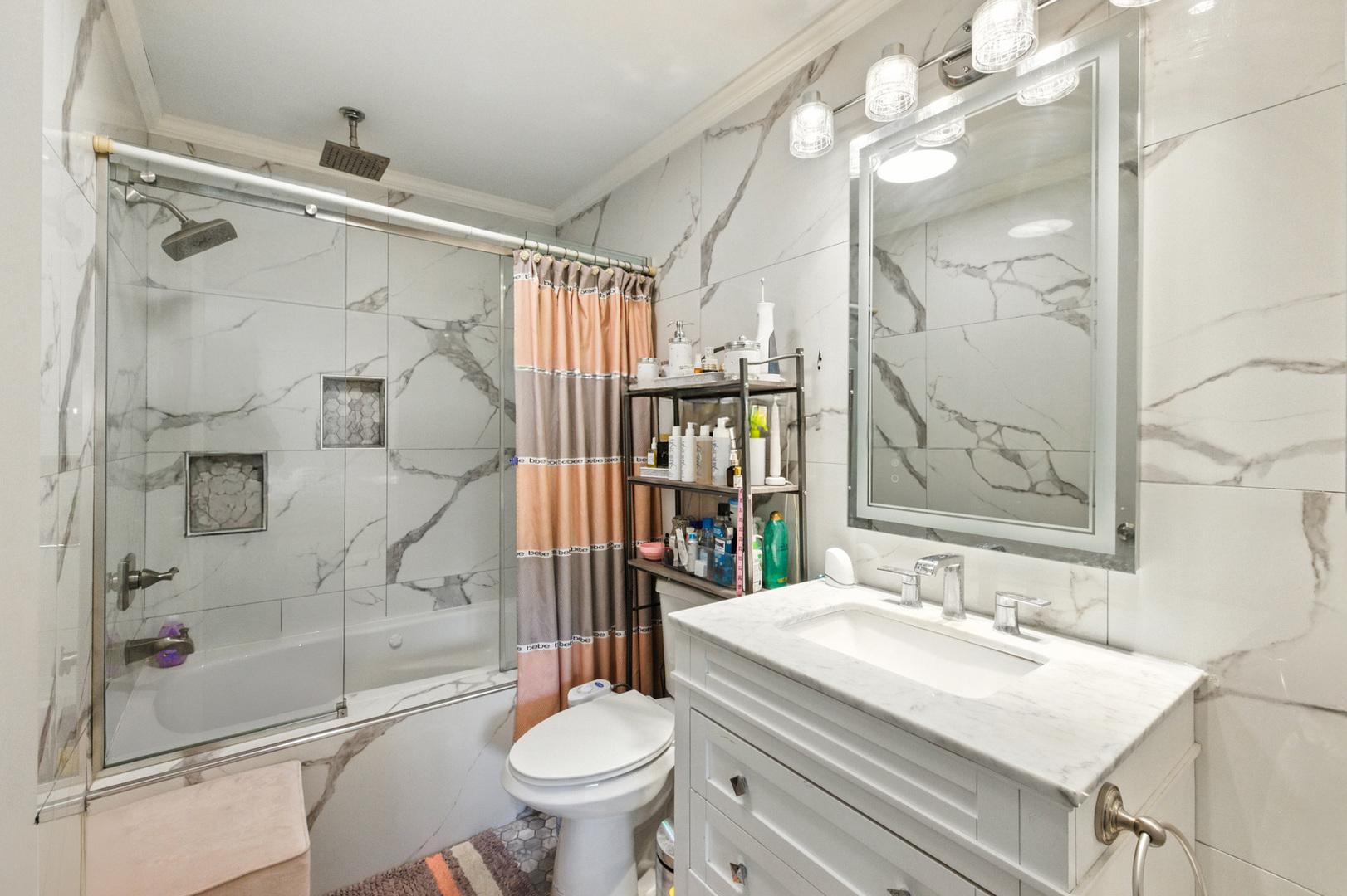 2938 East Shagbark Trail Crete, IL 60417 - Photo 18 of 26 a bathroom with a sink toilet and shower