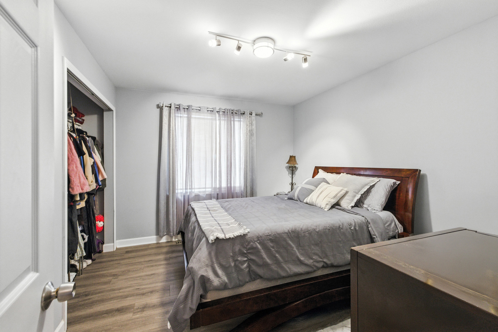 2938 East Shagbark Trail Crete, IL 60417 - Photo 20 of 26 a bedroom with a bed and a window