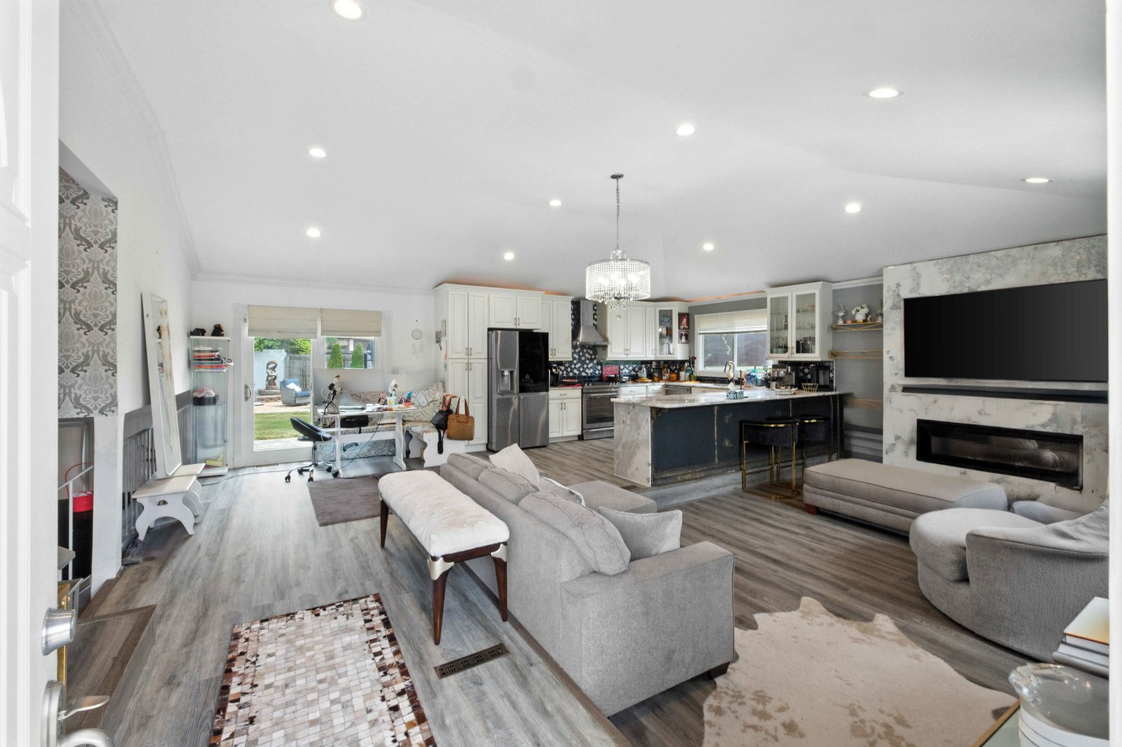 2938 East Shagbark Trail Crete, IL 60417 - Photo 2 of 26 a living room with furniture and a flat screen tv