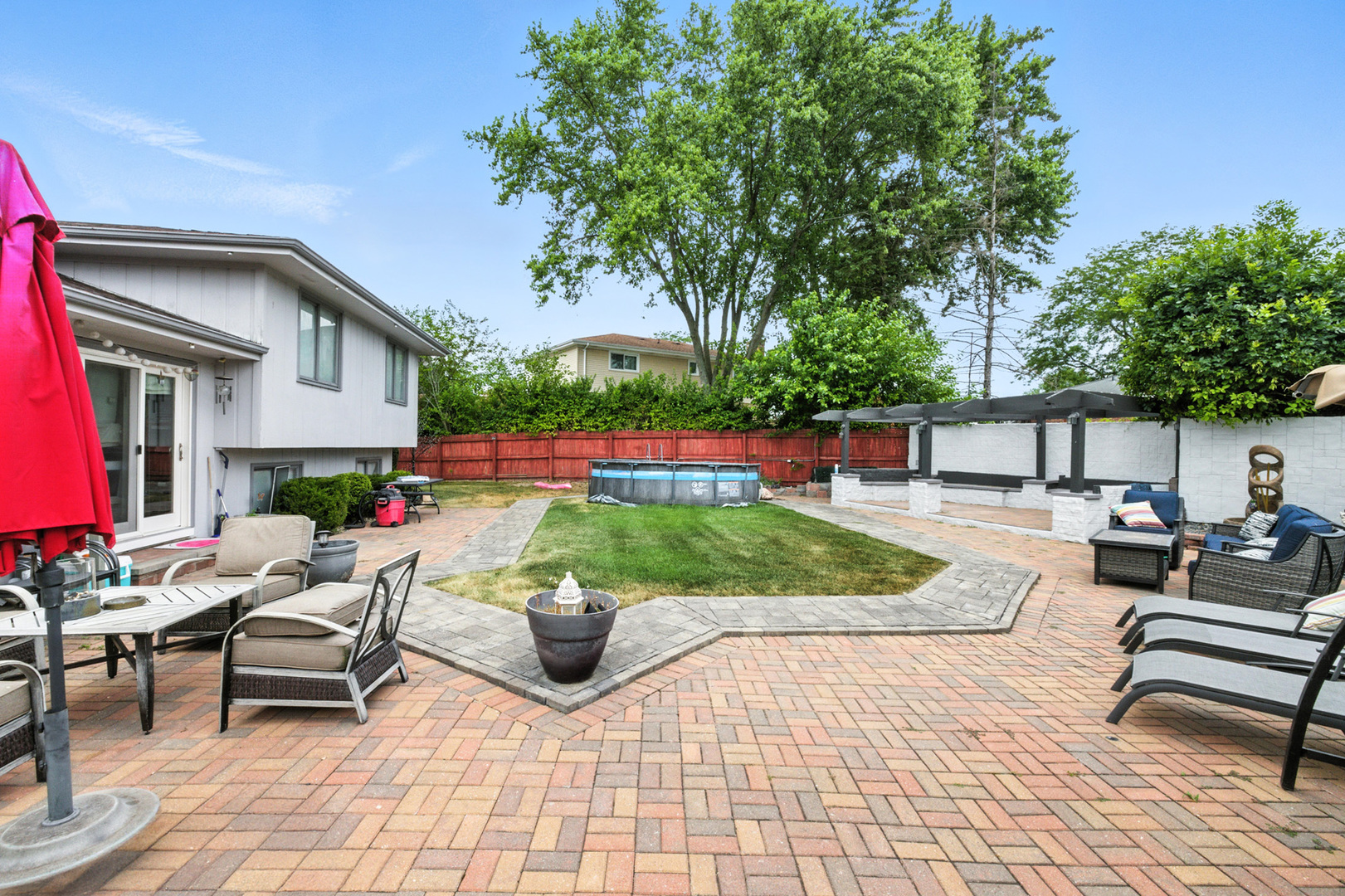 2938 East Shagbark Trail Crete, IL 60417 - Photo 21 of 26 a view of a house with backyard and sitting area