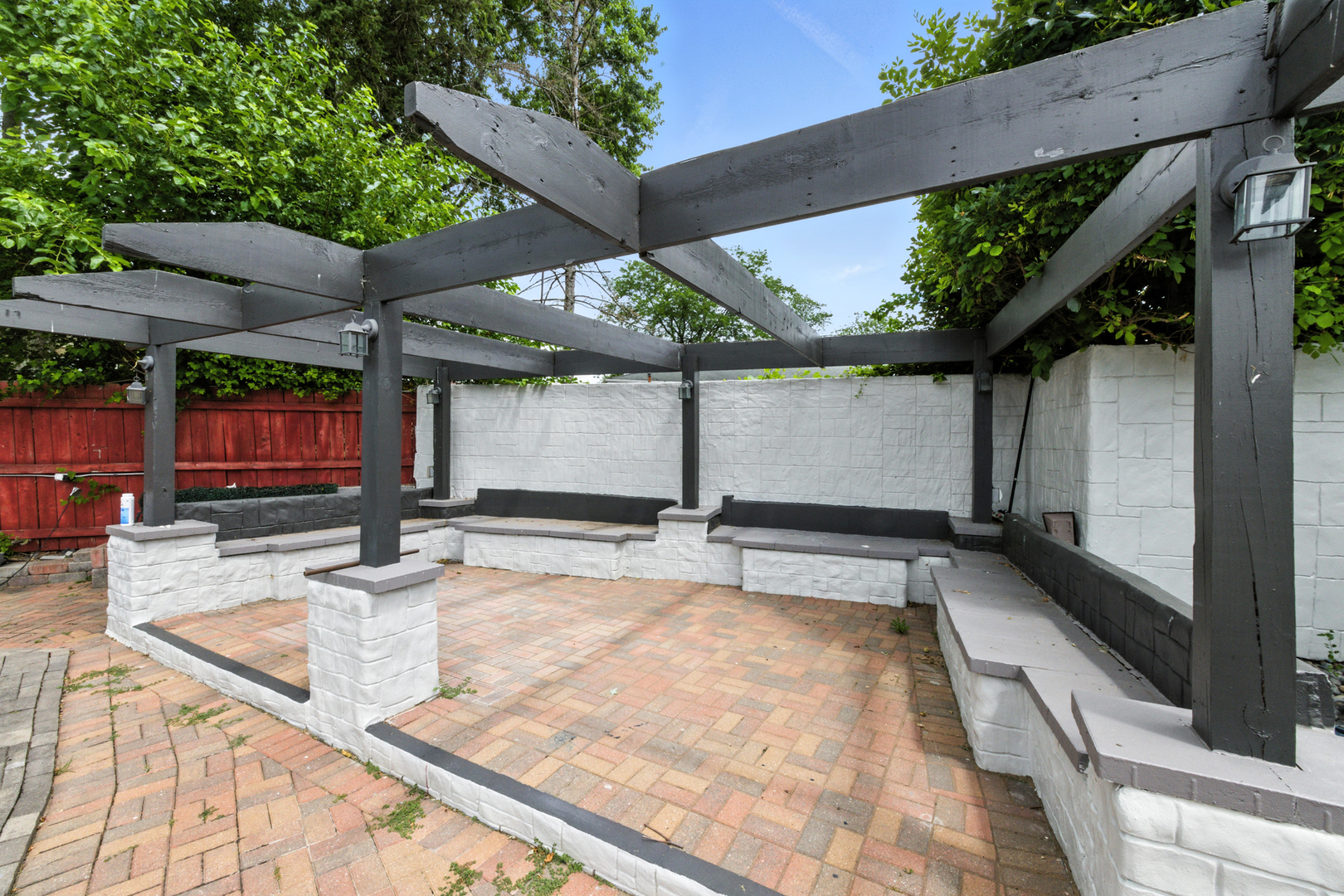 2938 East Shagbark Trail Crete, IL 60417 - Photo 23 of 26 a view of a backyard with a tub and wooden fence