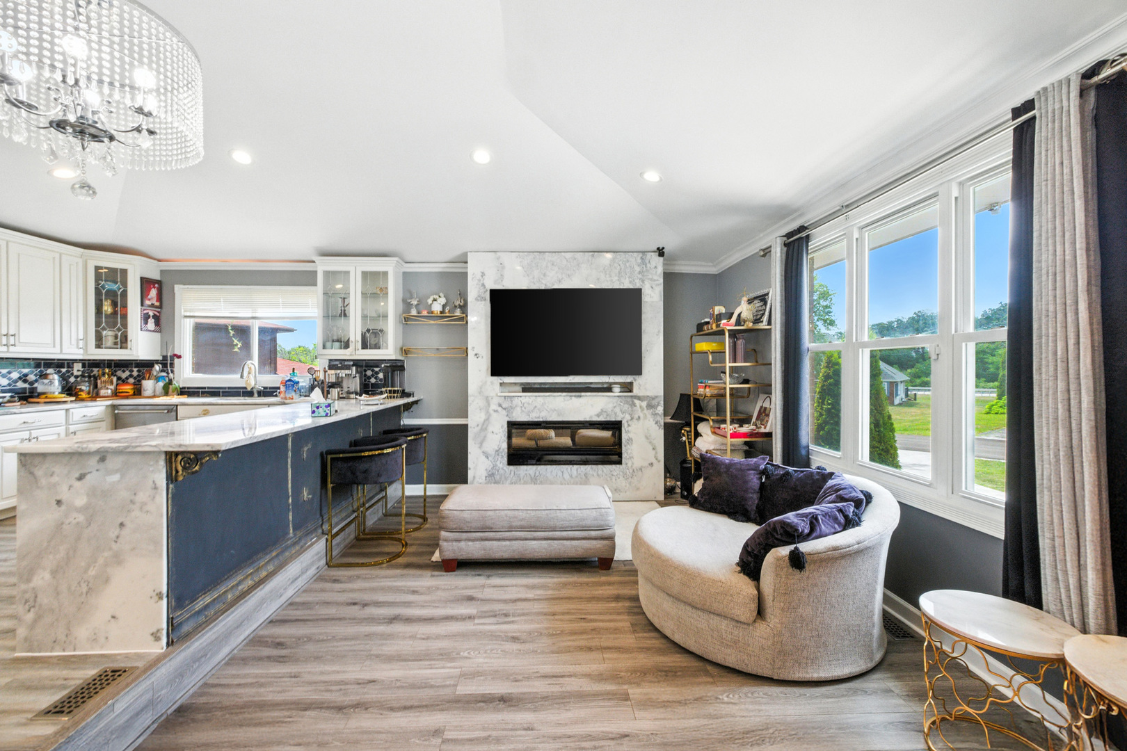 2938 East Shagbark Trail Crete, IL 60417 - Photo 3 of 26 a living room with furniture and a flat screen tv