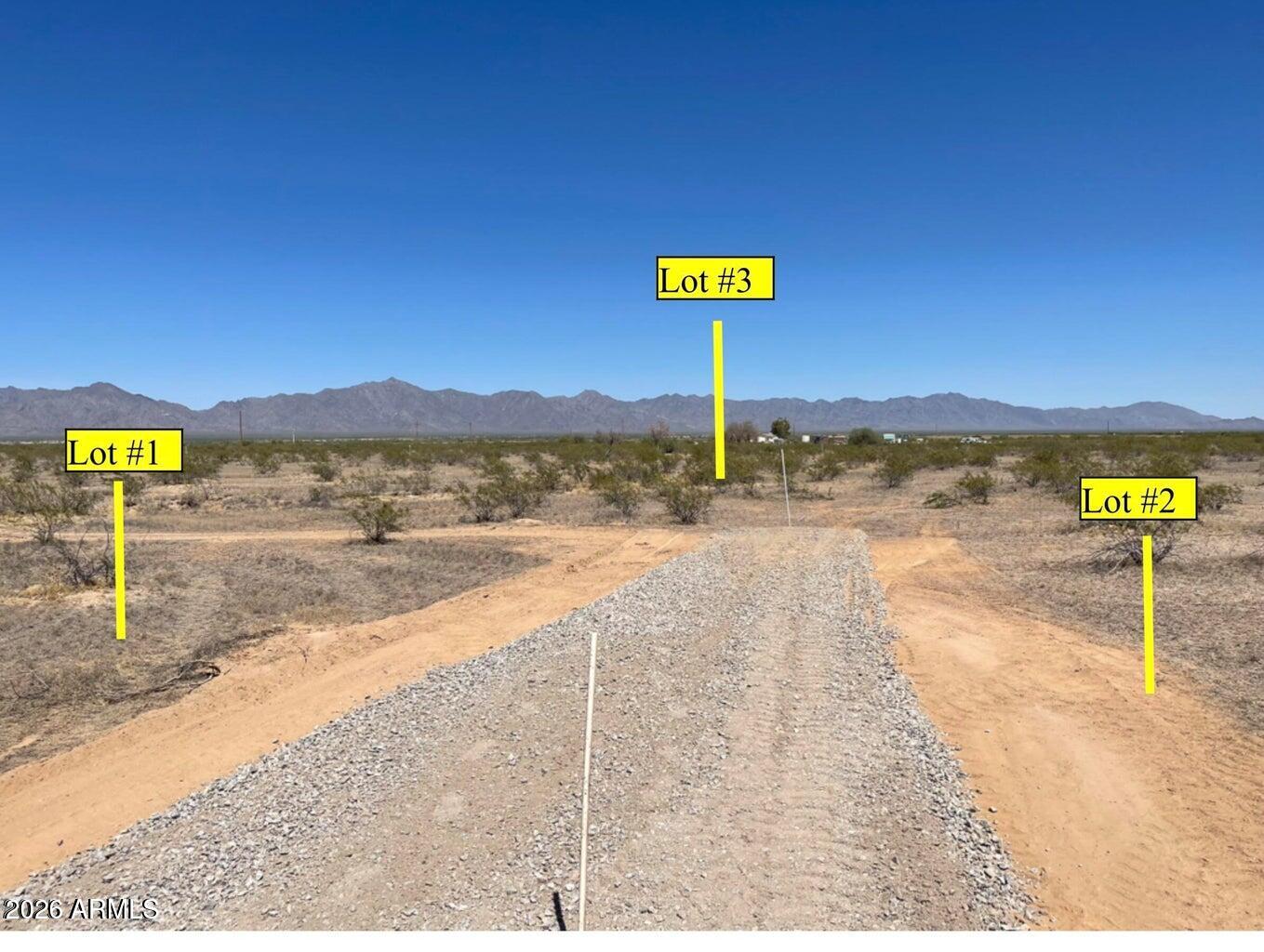 260-xx South Rainbow Valley Road, Unit 2 Buckeye, AZ 85326 - Photo 3 of 4 a view of a street with a building in the background
