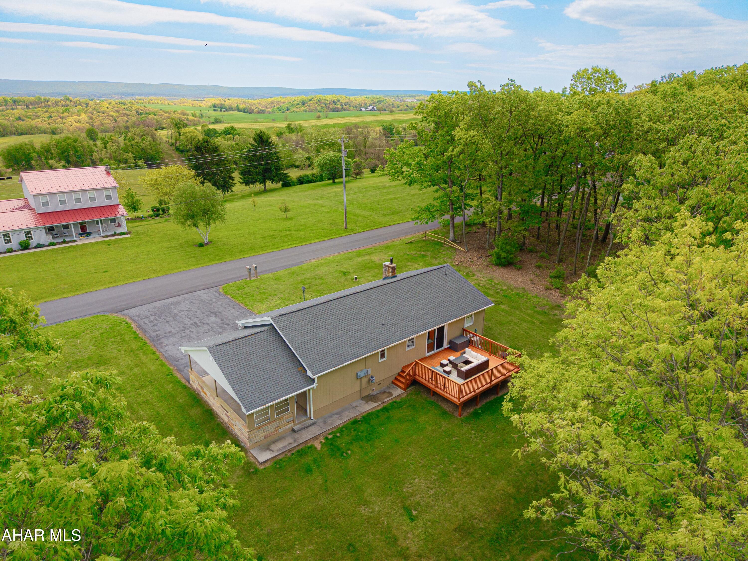 473 Calhoun Road Everett, PA 15537 - Photo 36 of 45 a view of a yard with an outdoor space