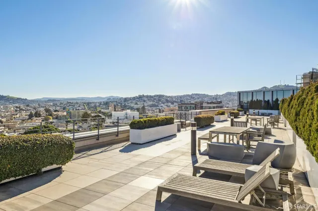a view of a terrace with outdoor seating