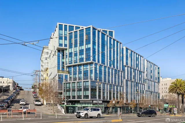 a view of a building with a street