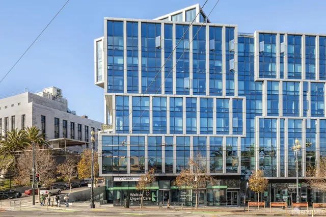 a view of a building with a street