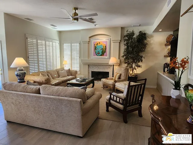 a spacious bathroom with a double vanity sink and a mirror