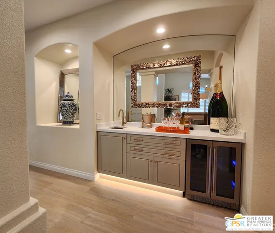 a kitchen with a table and chairs in it