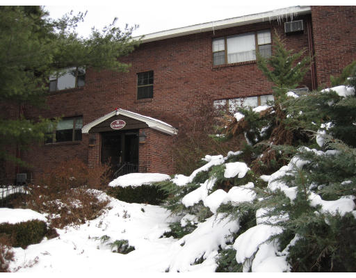 24 Spencer Road, Unit 22N Boxborough, MA 01719 - Photo 1 of 1 a view of a backyard of the house
