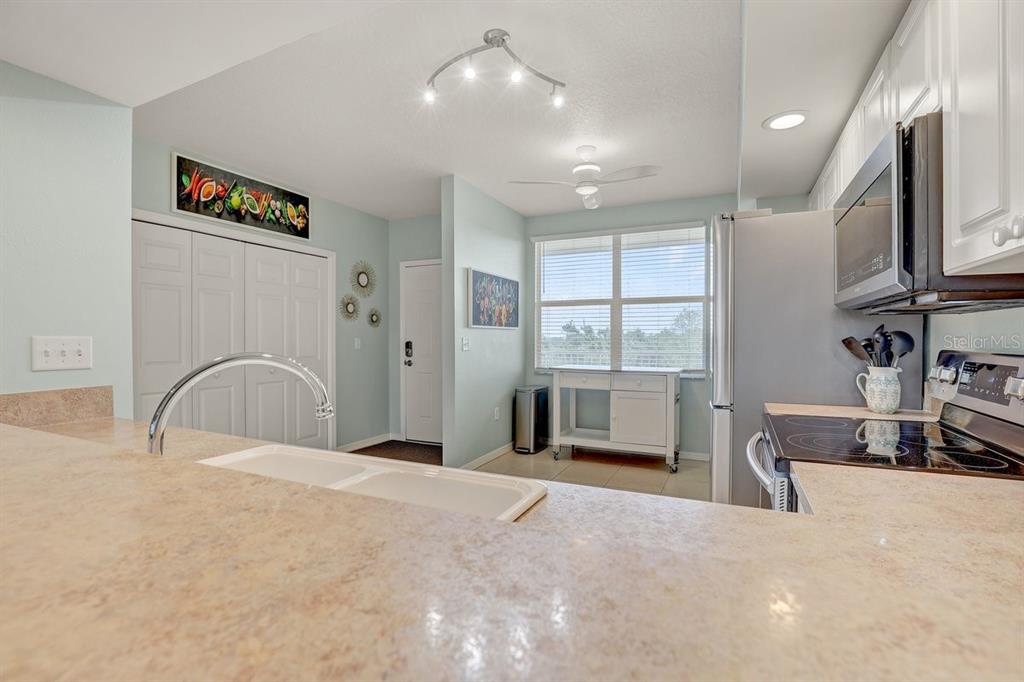 960 Starkey Road, Unit 2405 Largo, FL 33771 - Photo 9 of 31 a view of a livingroom with furniture