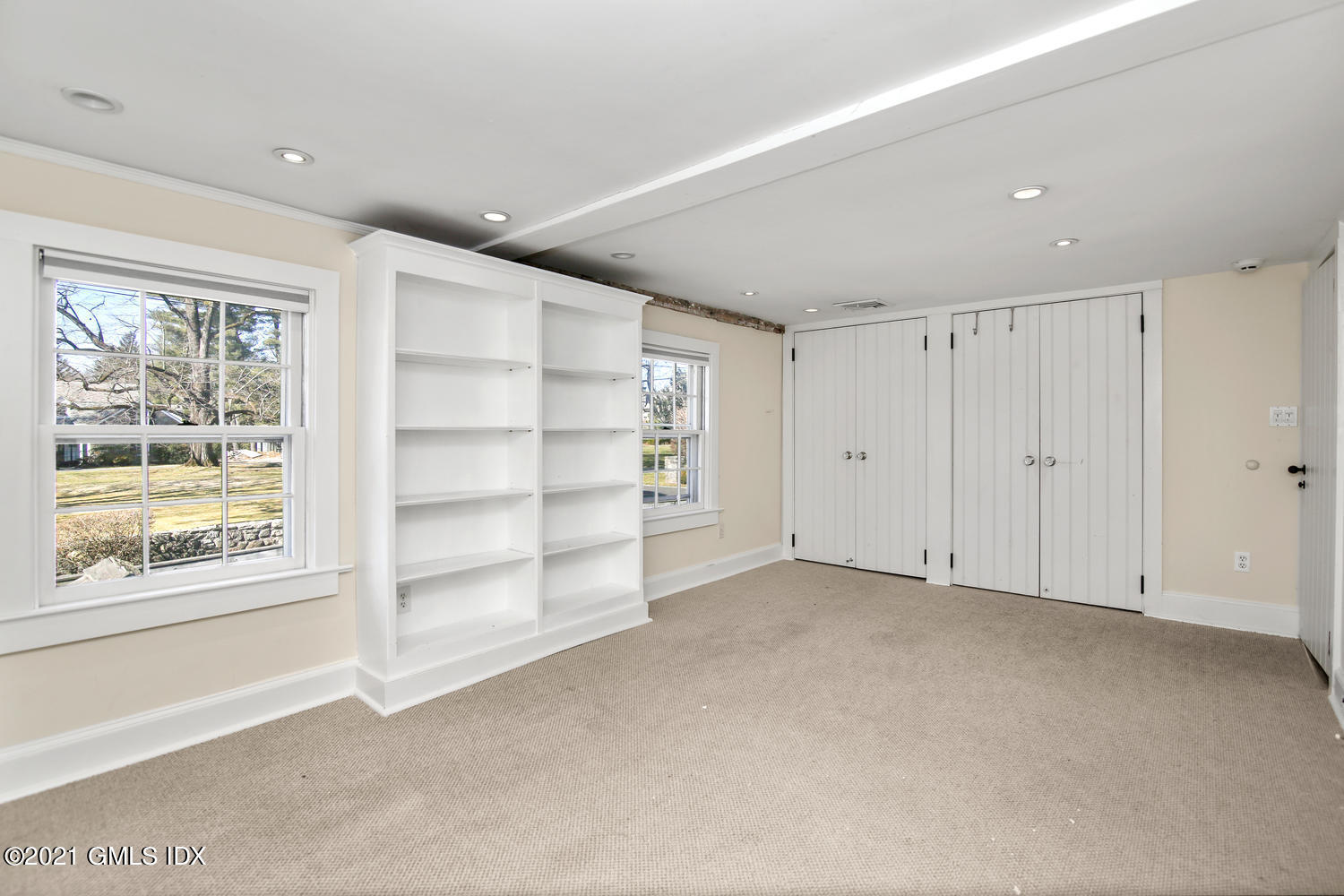 187 Stanwich Road Greenwich, CT 06830 - Photo 21 of 31 a view of an empty room with a window