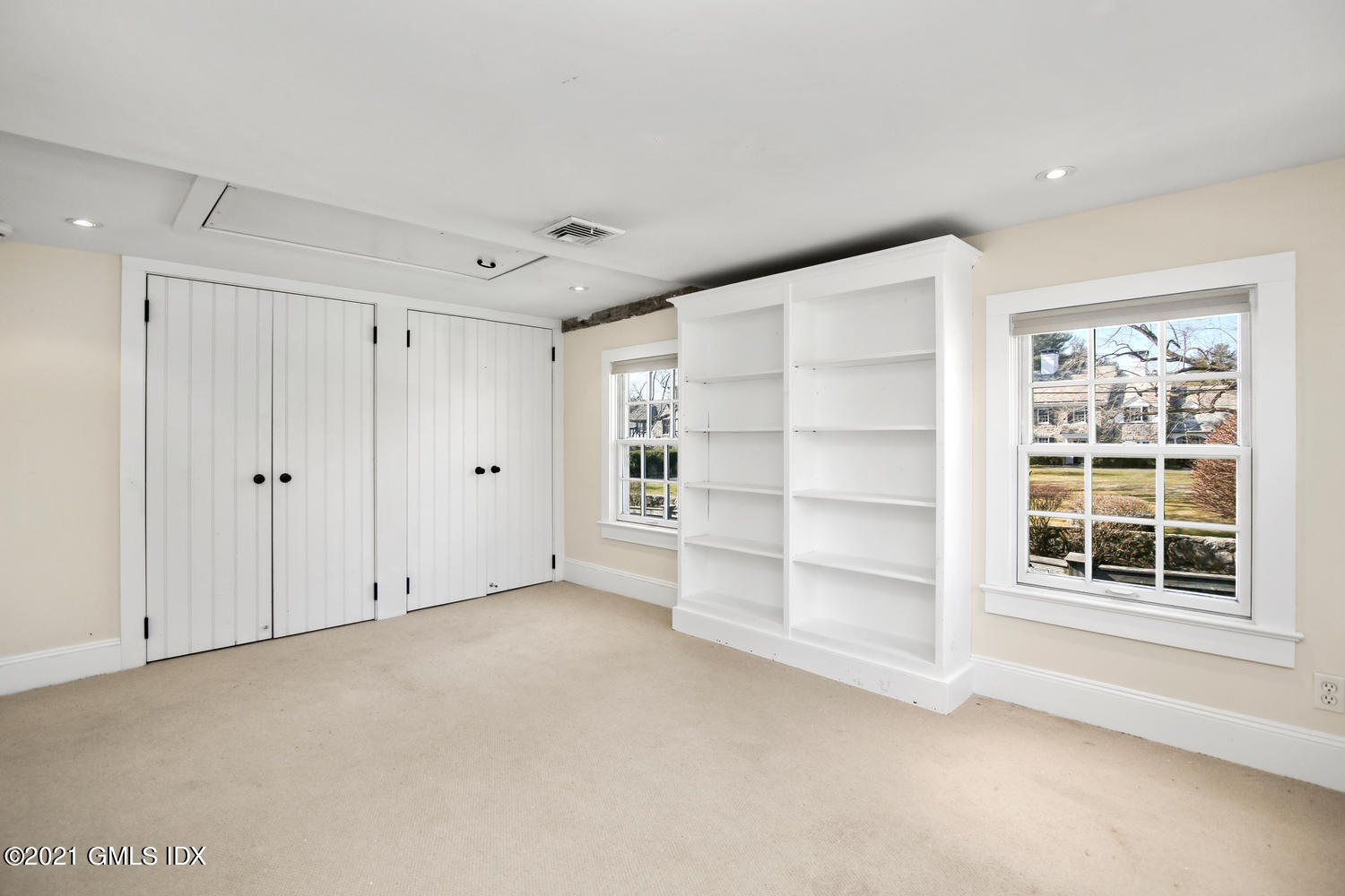 187 Stanwich Road Greenwich, CT 06830 - Photo 22 of 31 a view of an empty room with a window