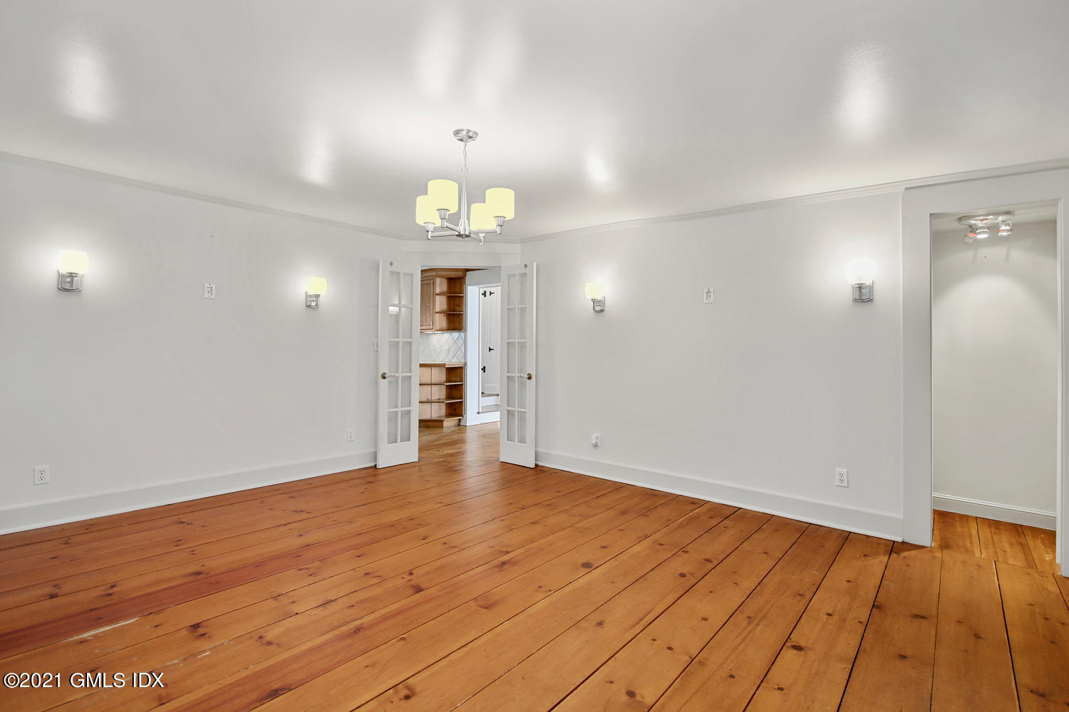 187 Stanwich Road Greenwich, CT 06830 - Photo 9 of 31 a view of empty room with wooden floor