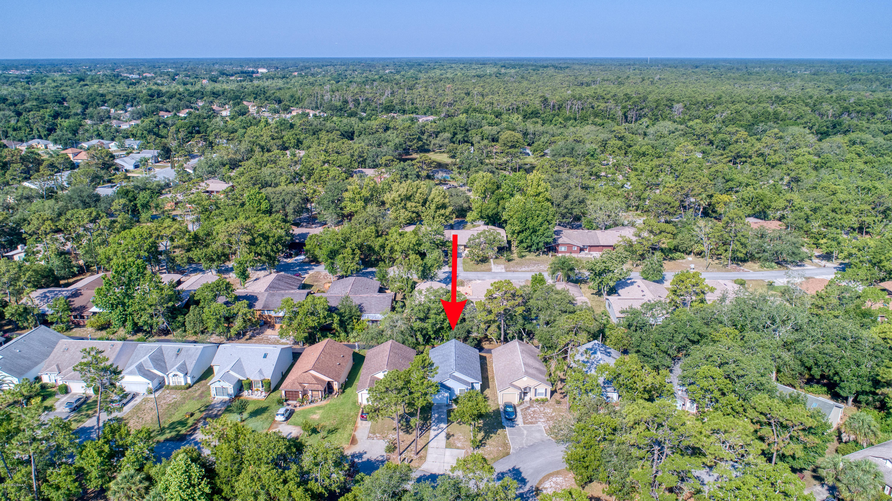 89 Crooked Pine Road Port Orange, FL 32128 - Photo 4 of 45 89CrookedPineRoad_Drone-3_arrow